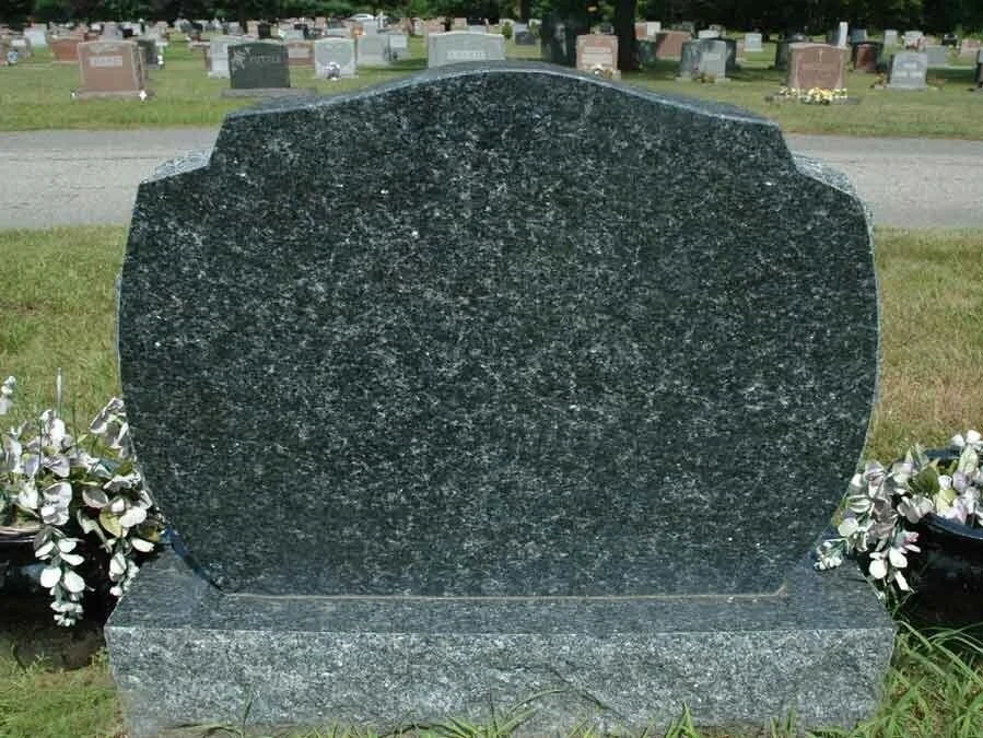 Granite headstone in a New England cemetery